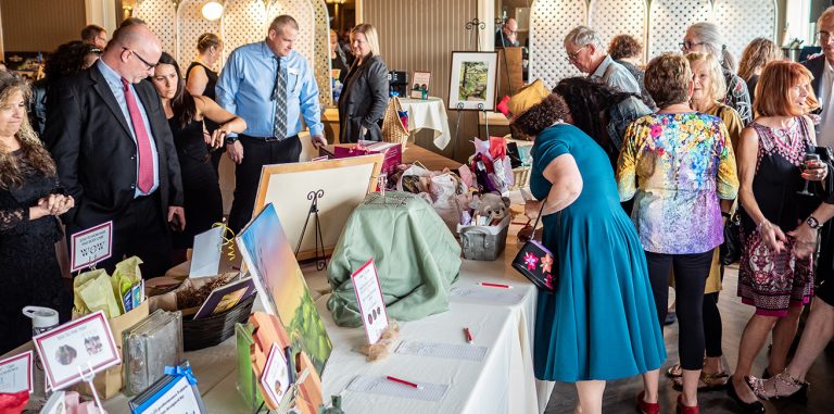 Silent auction at Heels for Meals & More fundraising event