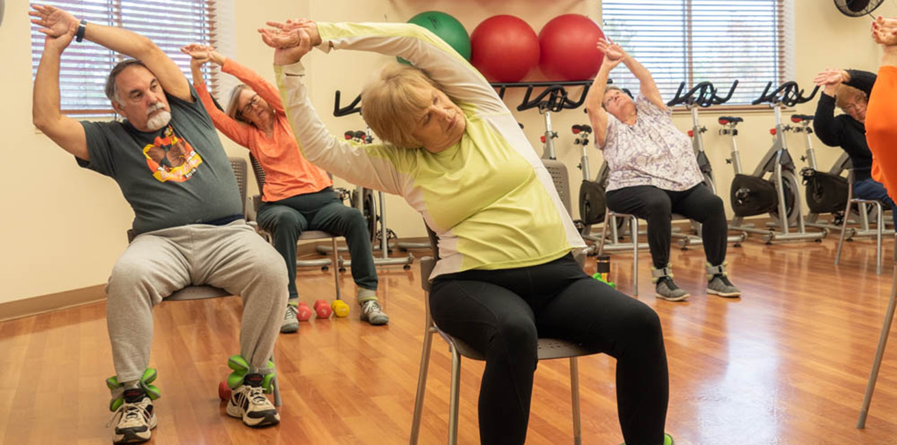 Men and women exercising