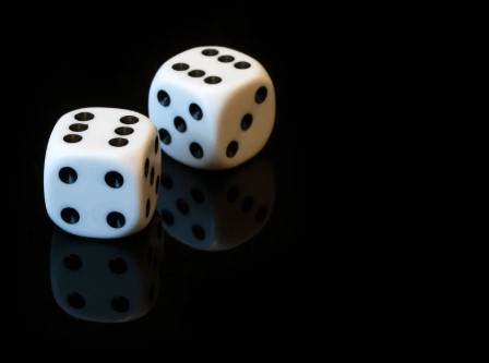 Two dice with reflections
